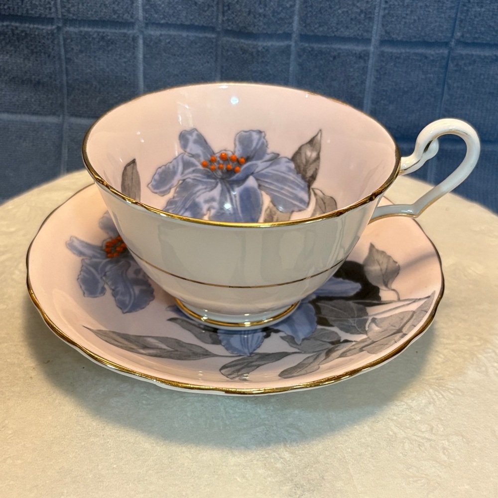 Windsor Floral Teacup and Saucer with Gold Trim. Raised flower centres